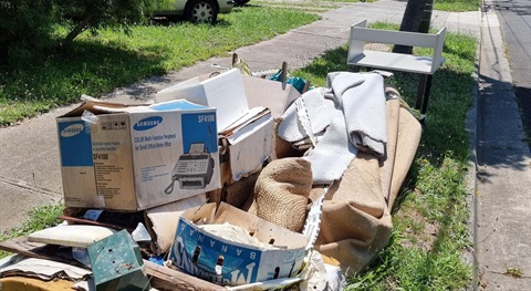 Dumped rubbish on a residential nature strip