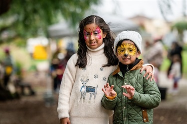 Two children with their face painted