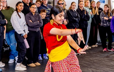 Cultural dance performed by a young girl 