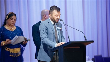 Deputy Mayor Councillor Naim Kurt delivering speech 