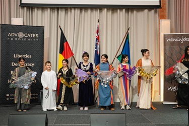 Kids dressed up on stage 