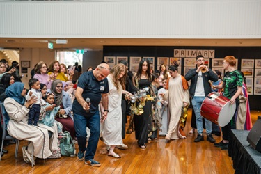 Kids dancing in front of a crowd 